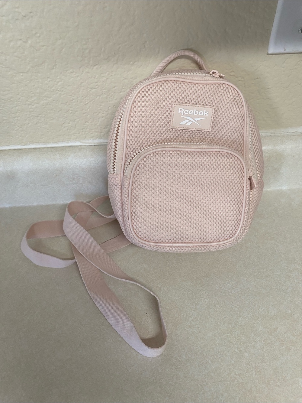 Reebok Women's Light Pink Mesh Mini Backpack